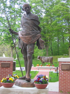 Gandhi statue with Emily Memorial in background