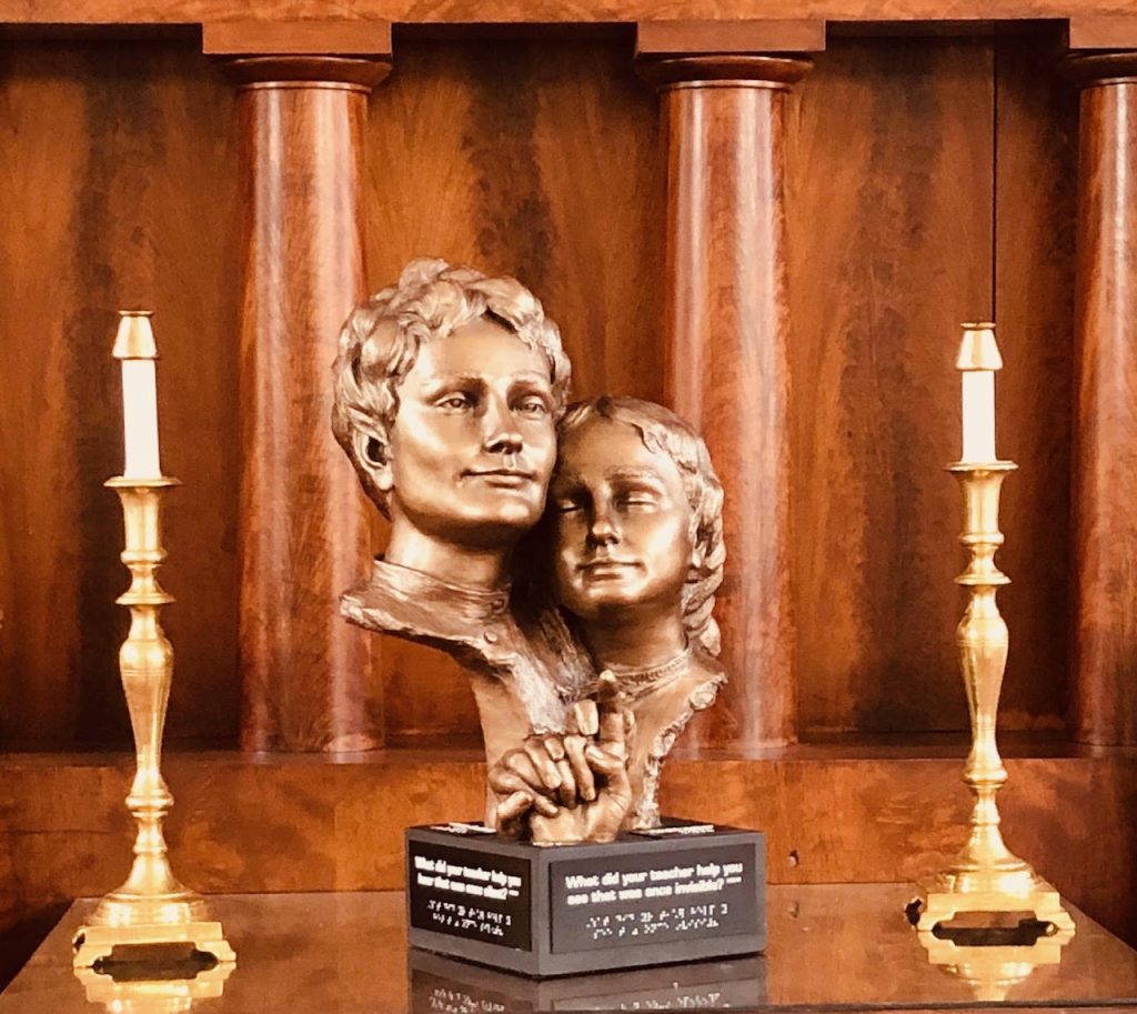 Photo of statue of Anne Sullivan and Helen Keller taken at First Parish Church in Duxbury, MA